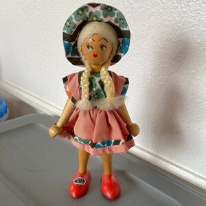 Little wooden girl made in Poland. Cute in her Polish attire.